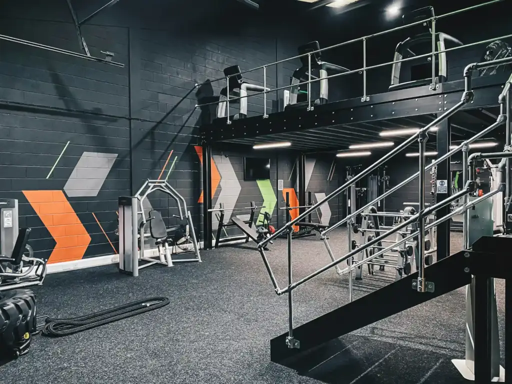 Modern gym interiors with sleek design and spacious layout.