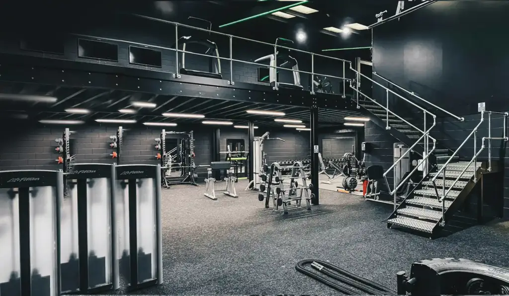 Contemporary gym interiors with open space and minimalistic design.
